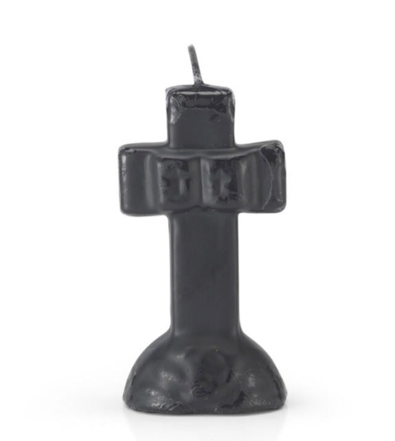 A beautifully carved black crucifix candle featuring flowing designs reminiscent of Celtic knots, perfect for candle magic and altar decorations.